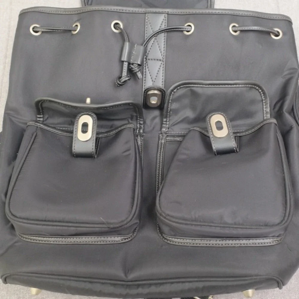 Ebel Black Nylon Faux Leather Turn Lock Cinch‎ Top Travel Backpack